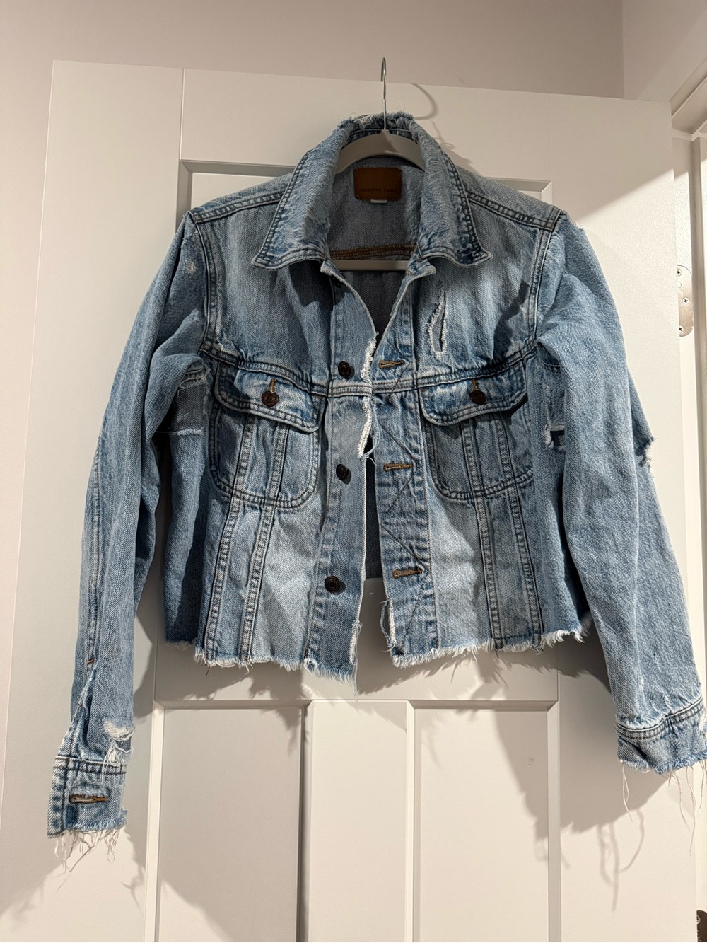 American Eagle Outfitters Light Wash Distressed Denim Jacket